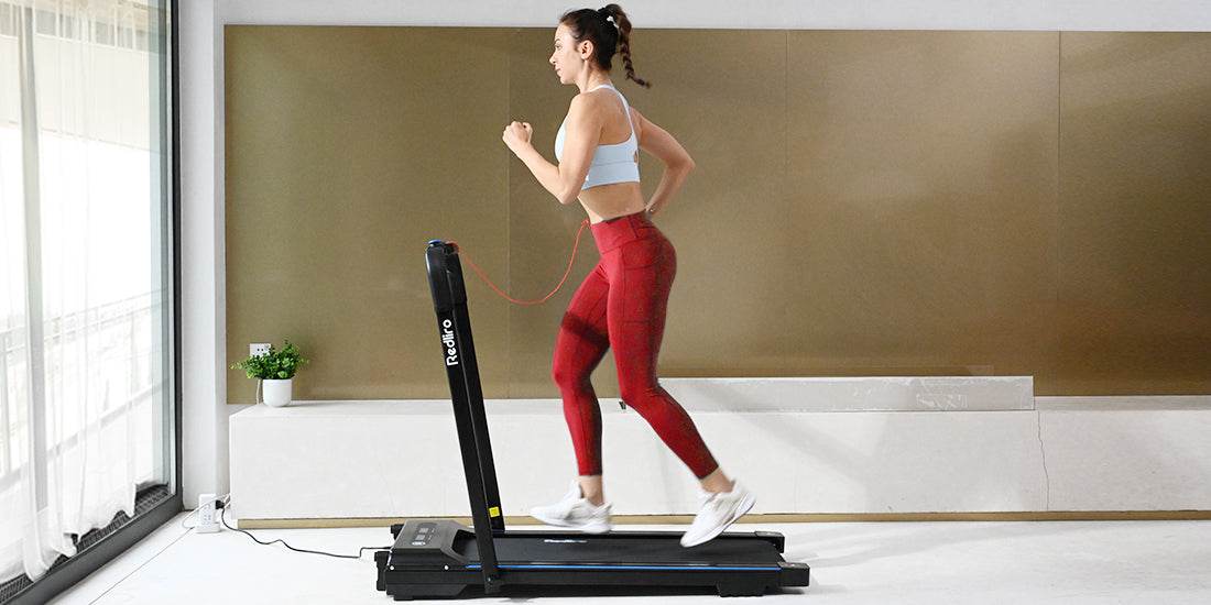 A girl is running on Redliro treadmill.